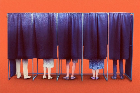 Image Description: People in voting booths